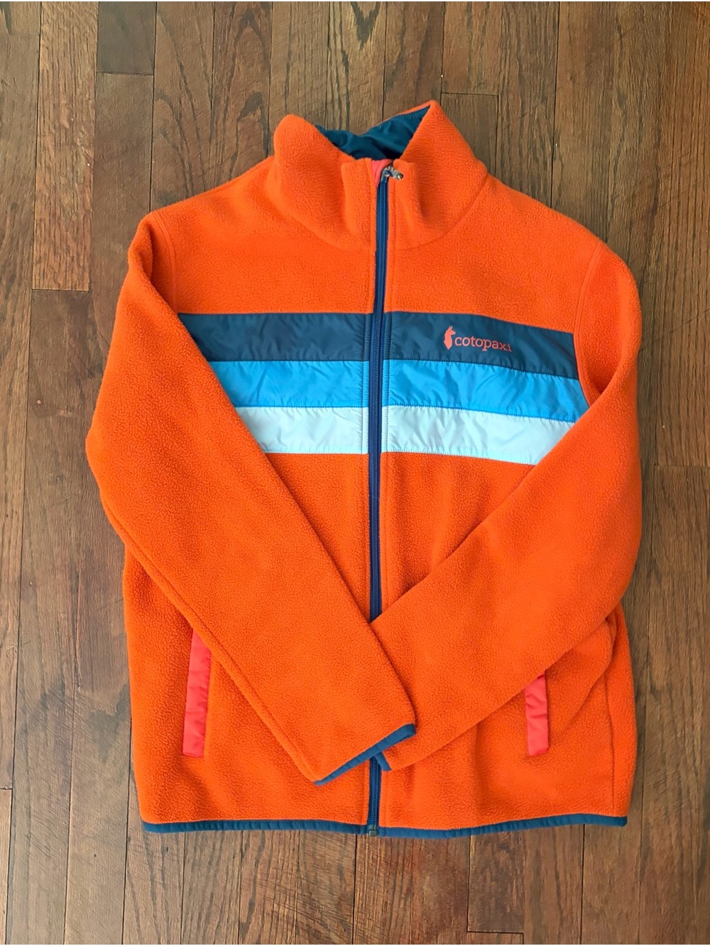 Cotopaxi men’s medium Orange Fleece Jacket with Blue Stripe